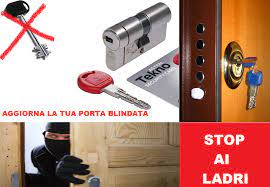 Conversione da vecchia chiave doppia mappa a cilindro europeo di sicurezza Cisa Astral Tekno per porta blindata contro i furti a Torino.